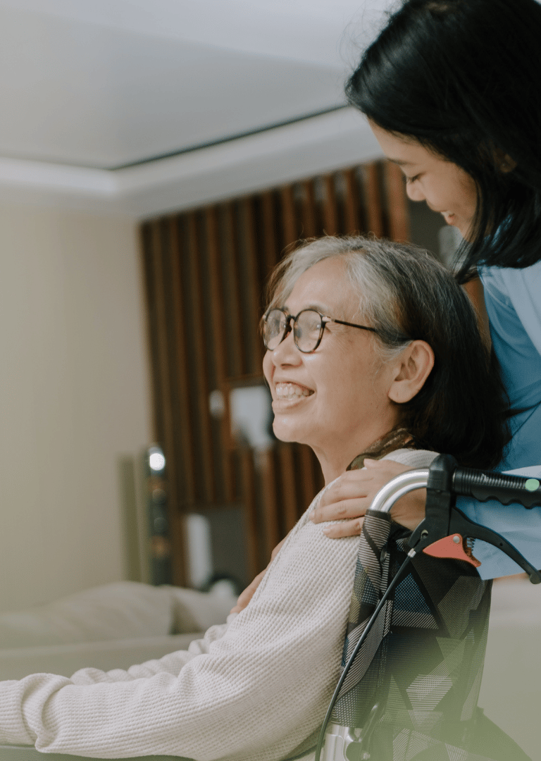 woman in wheelchair, caring for elderly