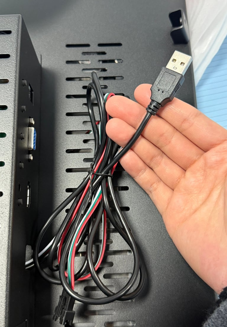 ClaraTech Halo monitor back panel showing USB interface for SDK synchronization and protocol control.