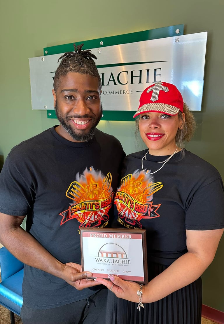 two people holding aframe