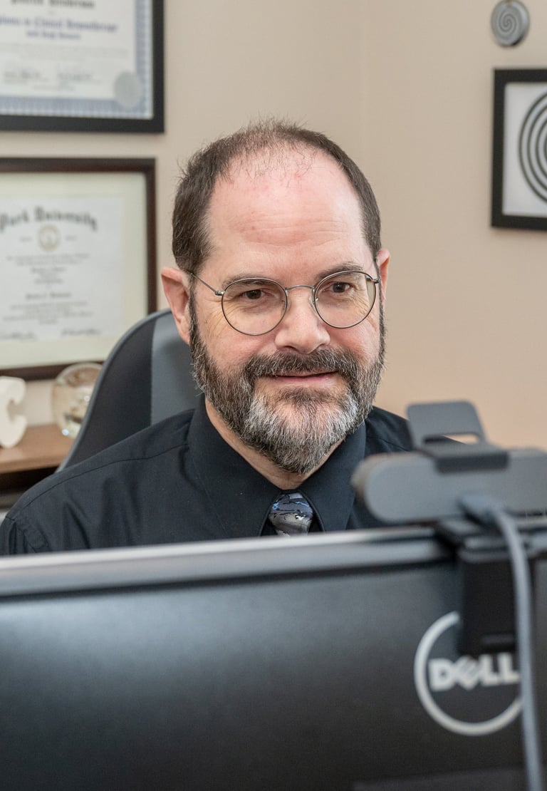 a man in a black shirt and tie dye dye dye dye dye dye dye dye