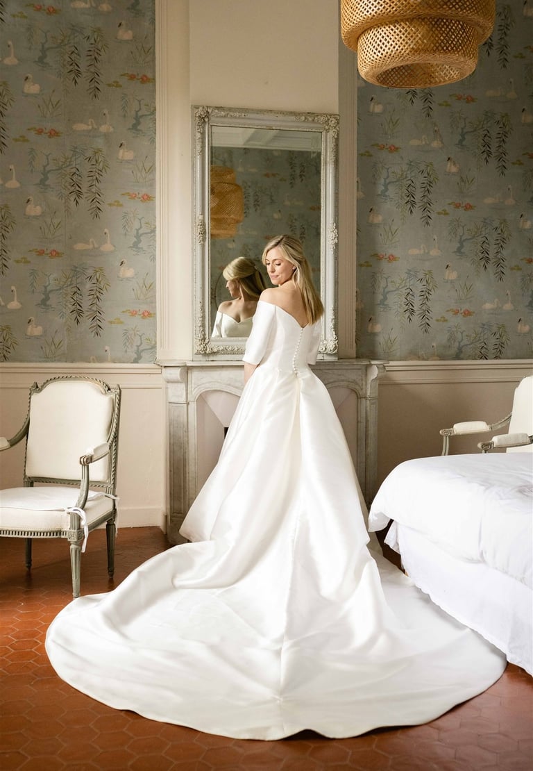 Bride getting ready in a château suite in Provence - Editorial wedding photo style