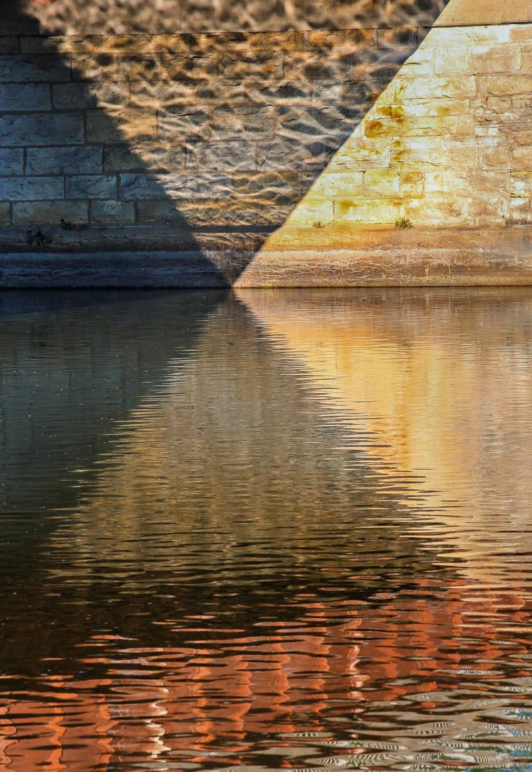 Glimmering river in yellow and red.