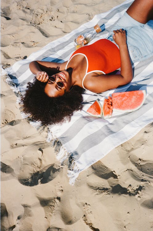 femme vacances bronzer vitamine D musculation Bien-être