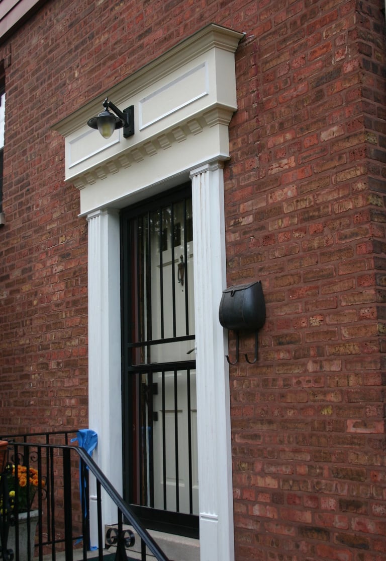 Similar custom trim for the front door. Added new porch light, too. Then painted shortly after this 