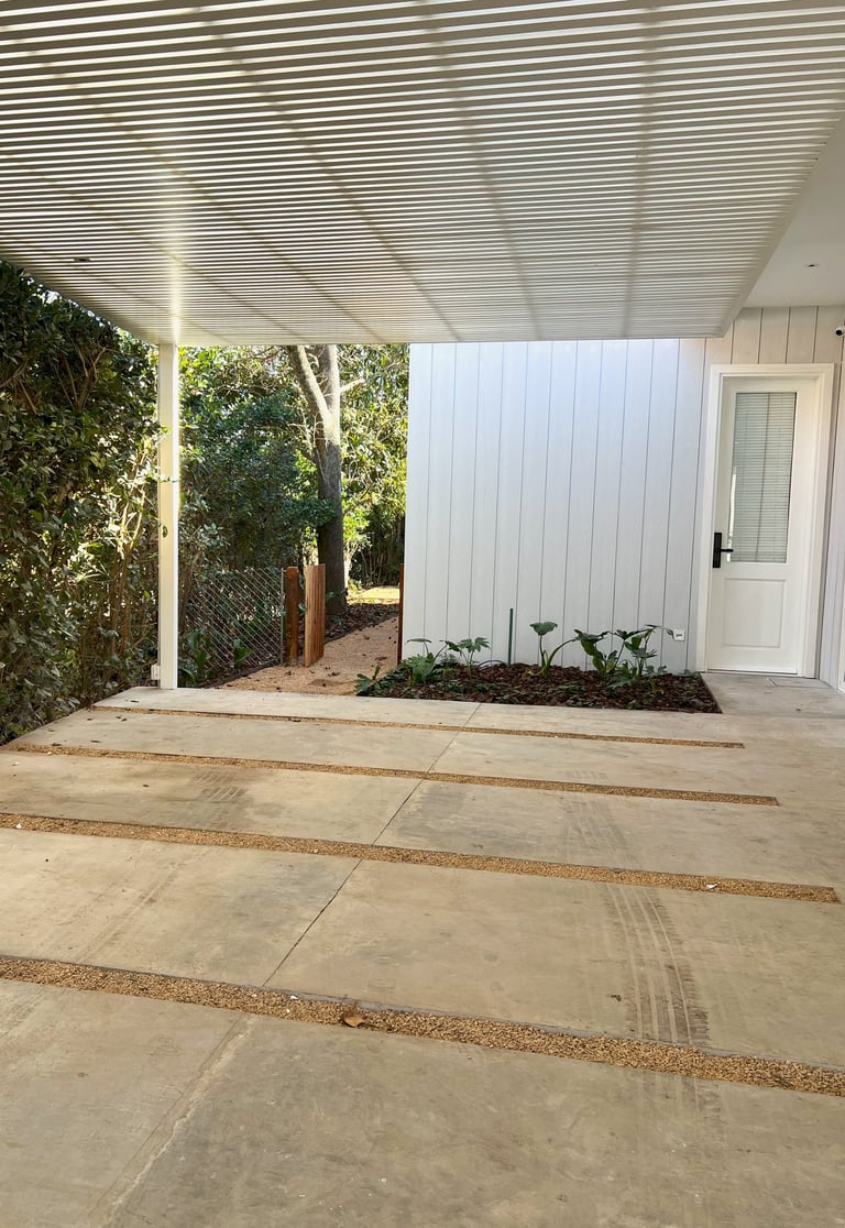 a patio with a white roof and a white roof