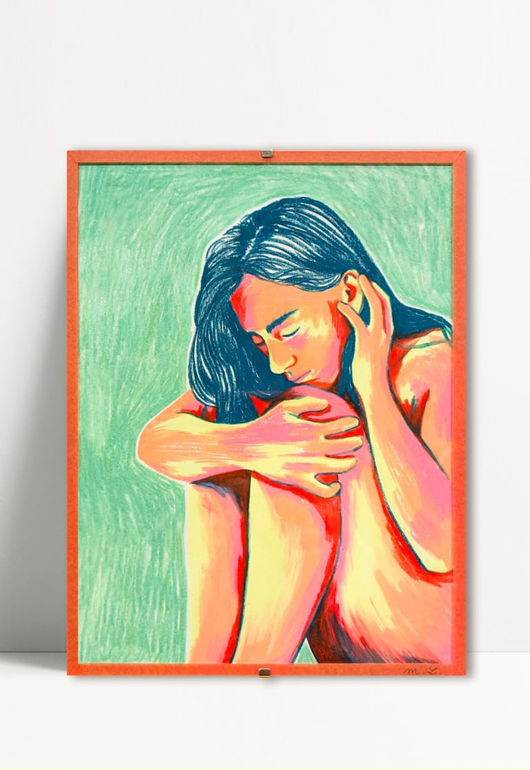 a woman with a blue dress sitting on a table
