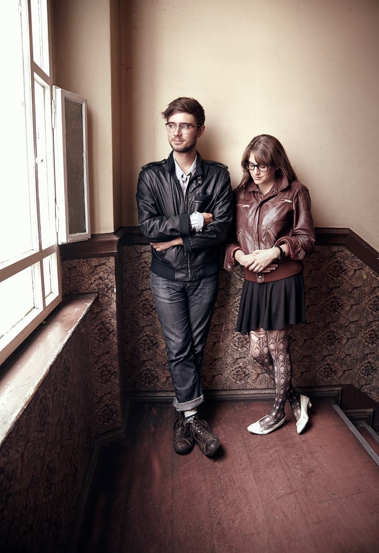 Band Fenster photographed in a staircase in an old building.