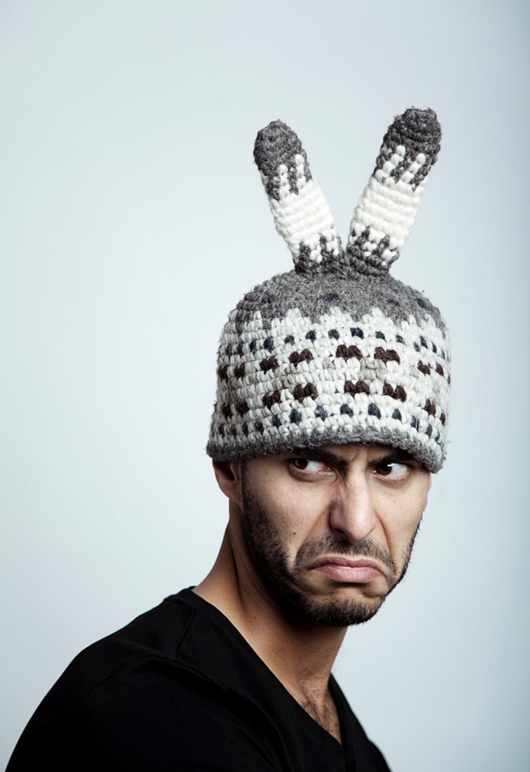 Ray Mann photographed with a grimace with a funny hat.