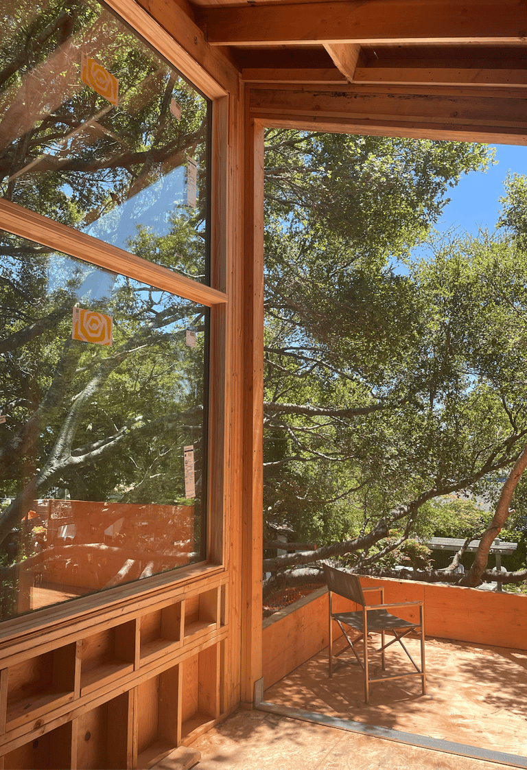 primary suite with balcony in framing stage