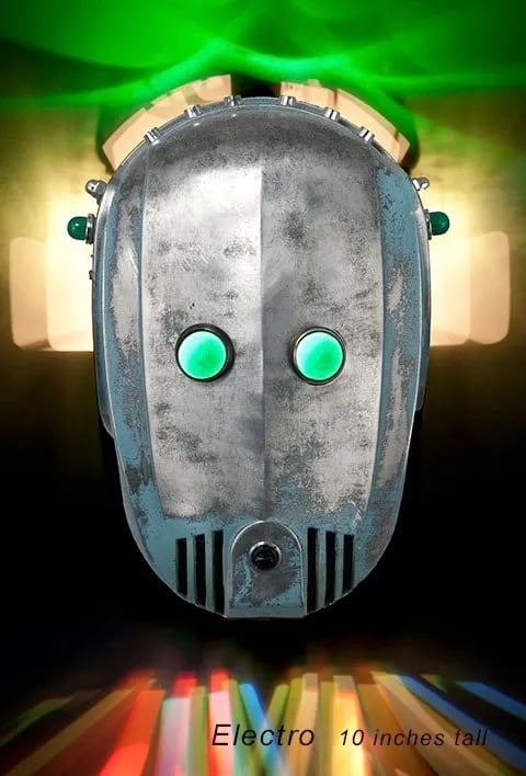 Found object robot head built from vintage floor polisher.