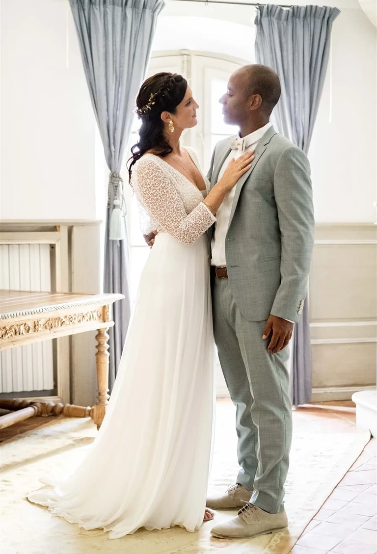 Editorial fine art portrait of bride and groom in a stunning château in the South of France