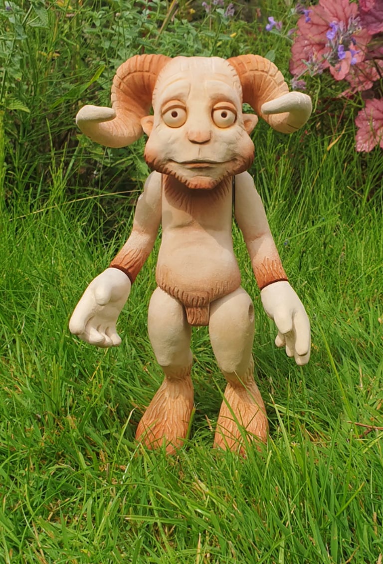 Original character sculpture produced using wood carving techniques