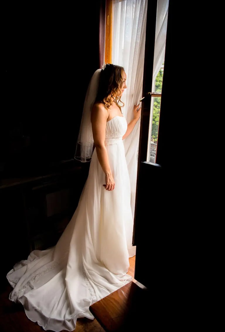 bride looking out of a window