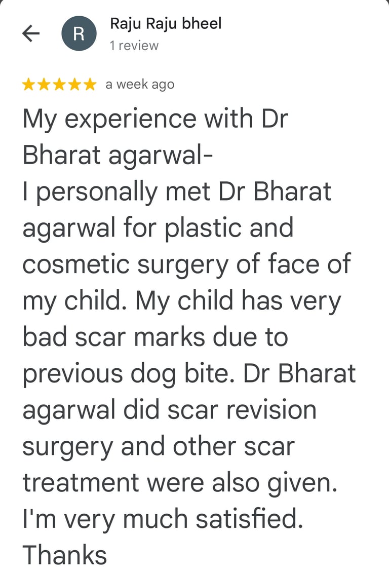 Best plastic surgeon in Udaipur Dr. Bharat Agarwal reviewing patient for scar revision treatment
