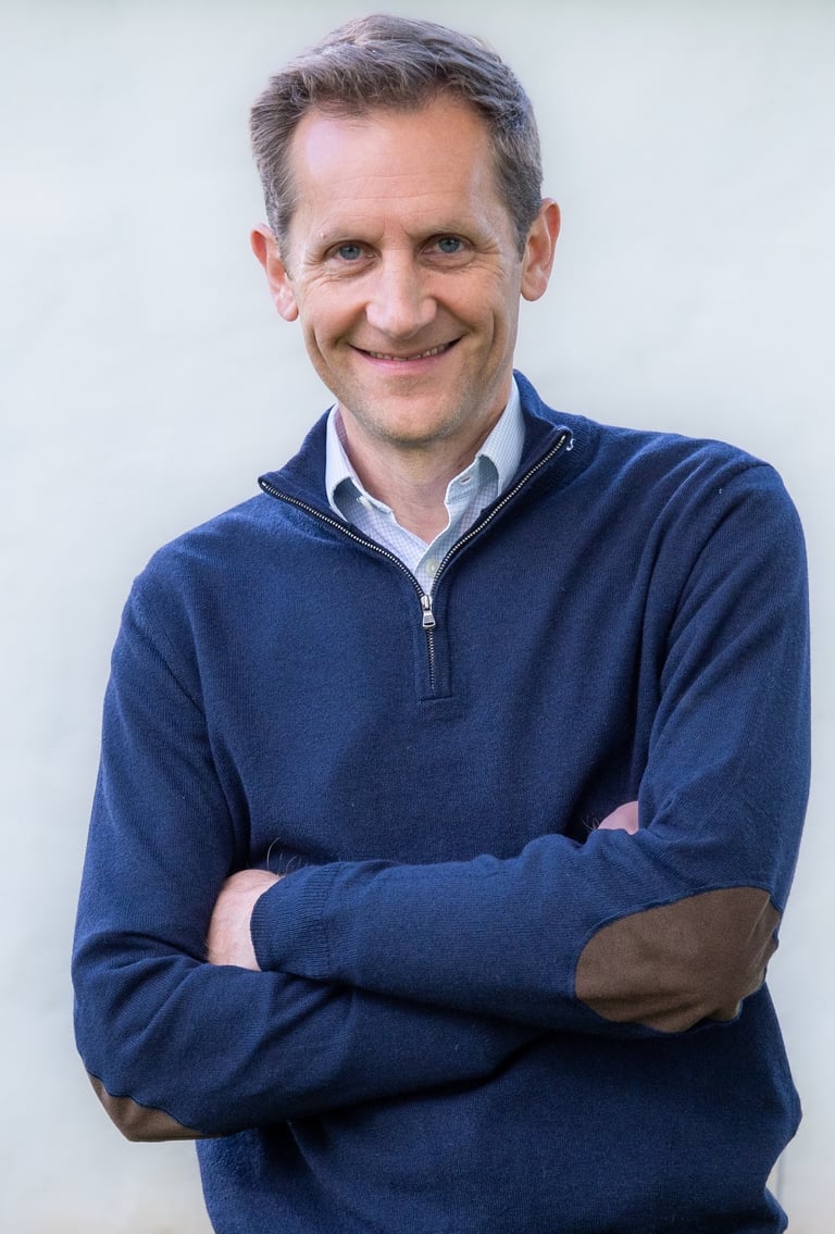 Marcus Norton with arms folded