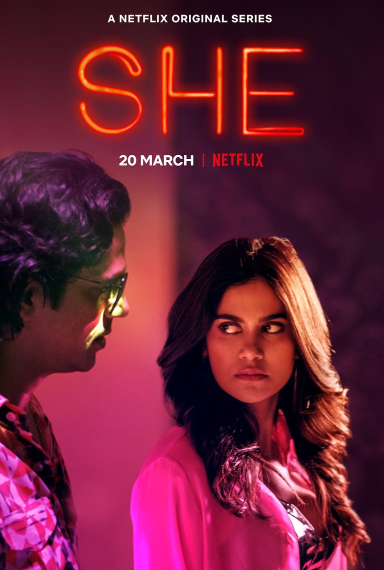 a man and woman standing next to each other in a movie poster