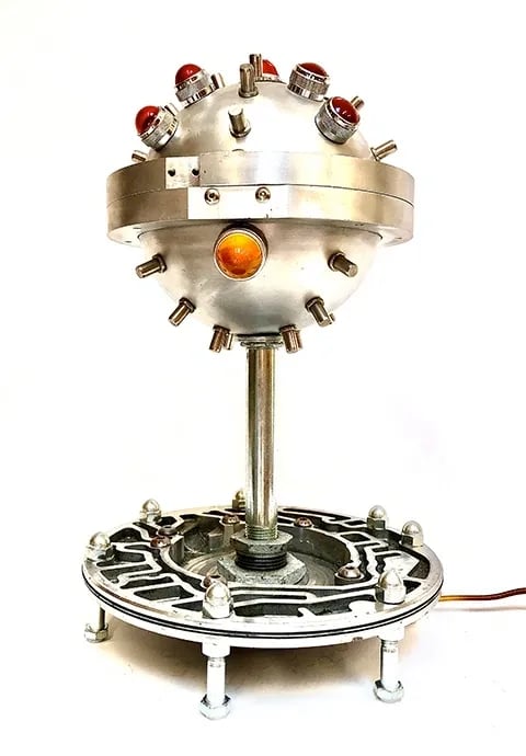 Custom light made from aluminum objects.