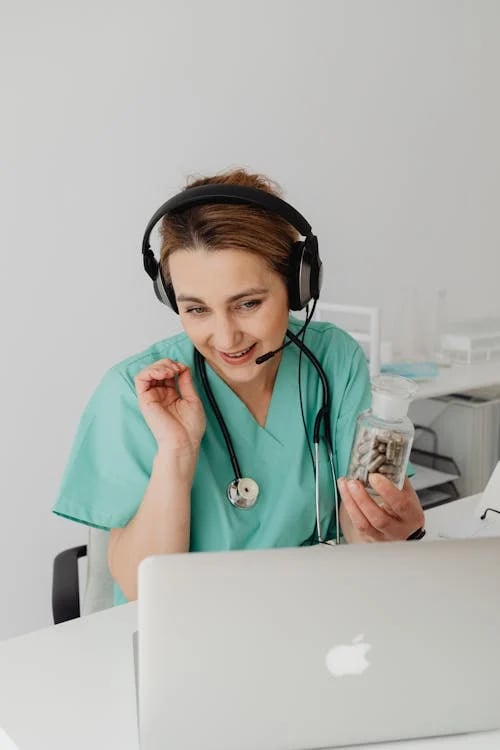 a nurse in scrubs and a nurse in scrubs