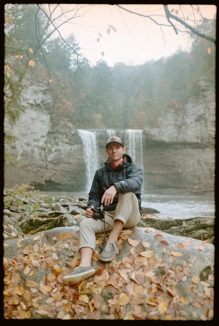 Photo by Lucas Wiman on film of Nate Bowery camera in hand at Fall Creek Falls State Park.