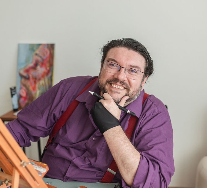 artista olhando para a camera.