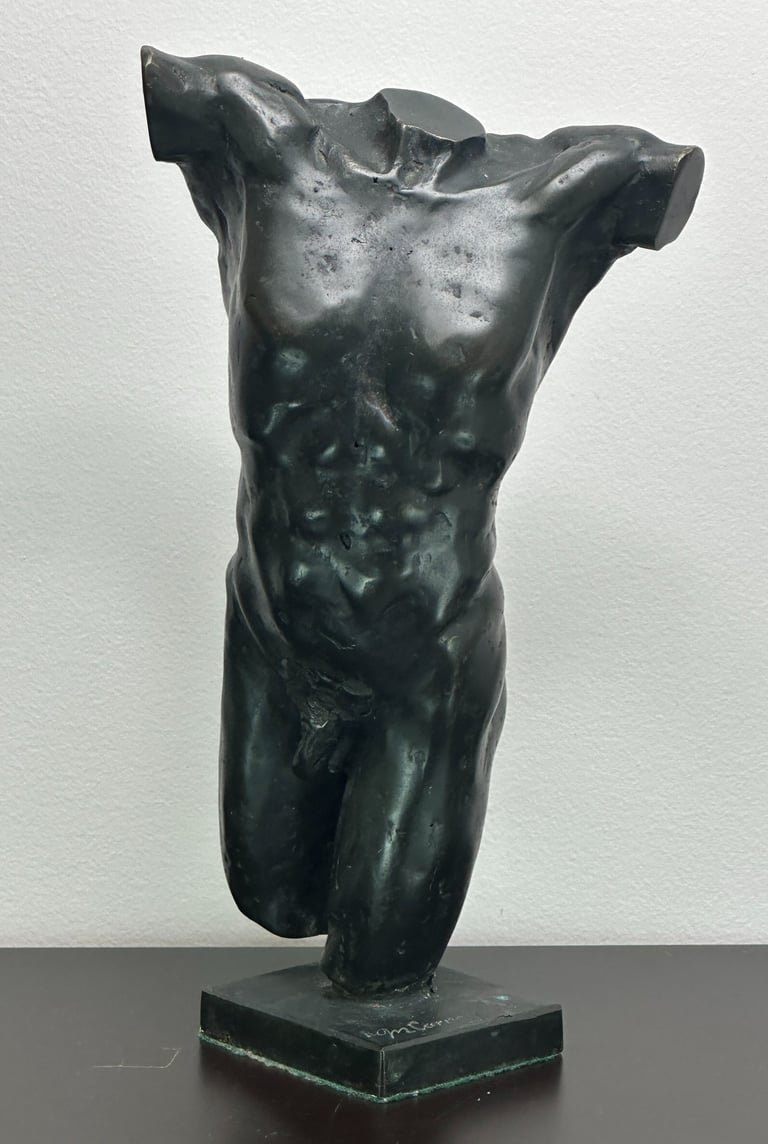a sculpture of a mans torso