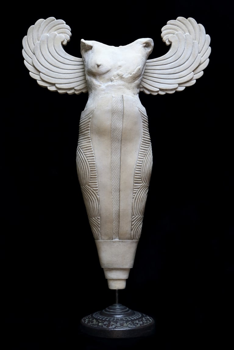 Small ceramic fragment of a nude figure with Greek Archaic wings, missing breast, and mermaid- or bee-like body.