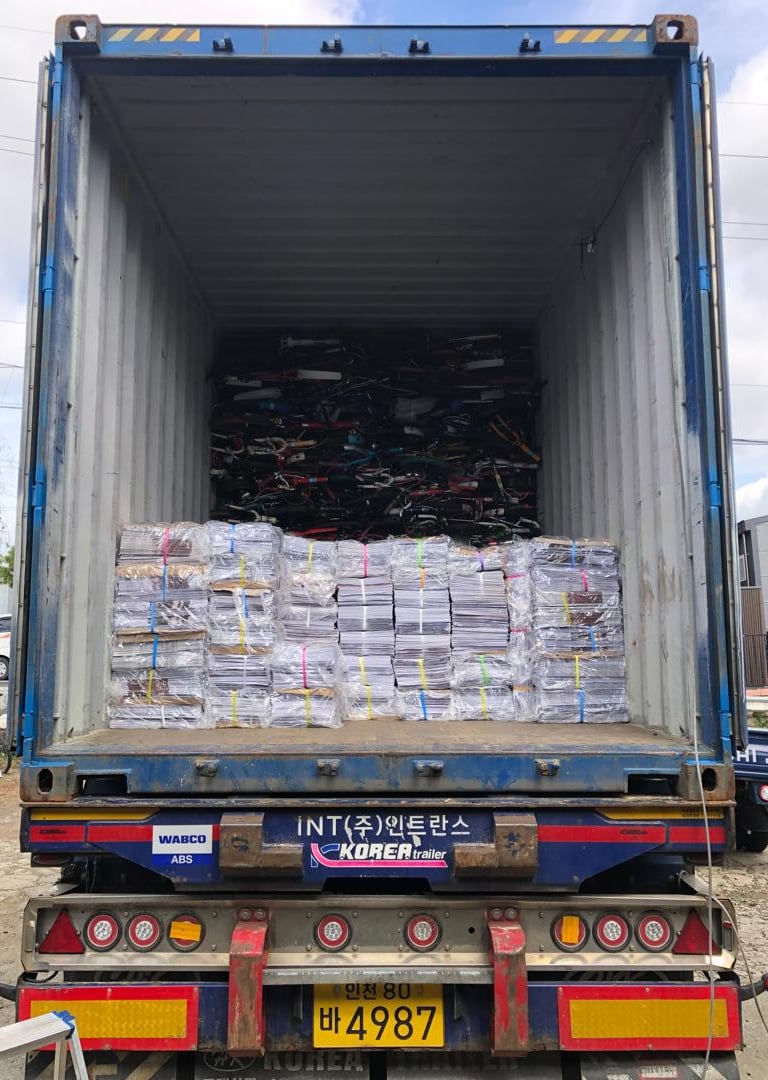 Container of used goods including bicycles and newspapers exported to Afghanistan from Korea