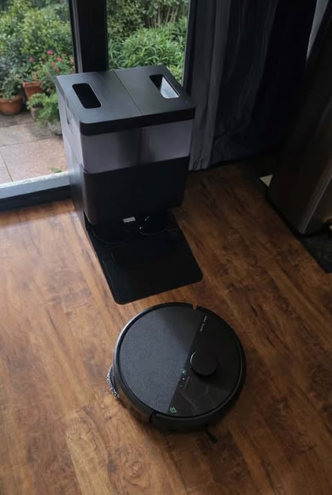 Roomba Plus 505 Combo Robot Vacuum & Mop on wooden floor.