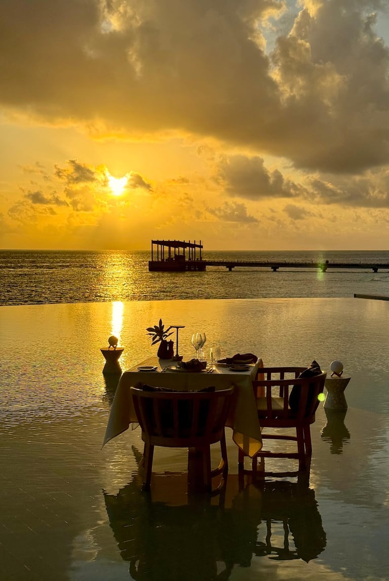 kudadoo maldives sunset pool dinner
