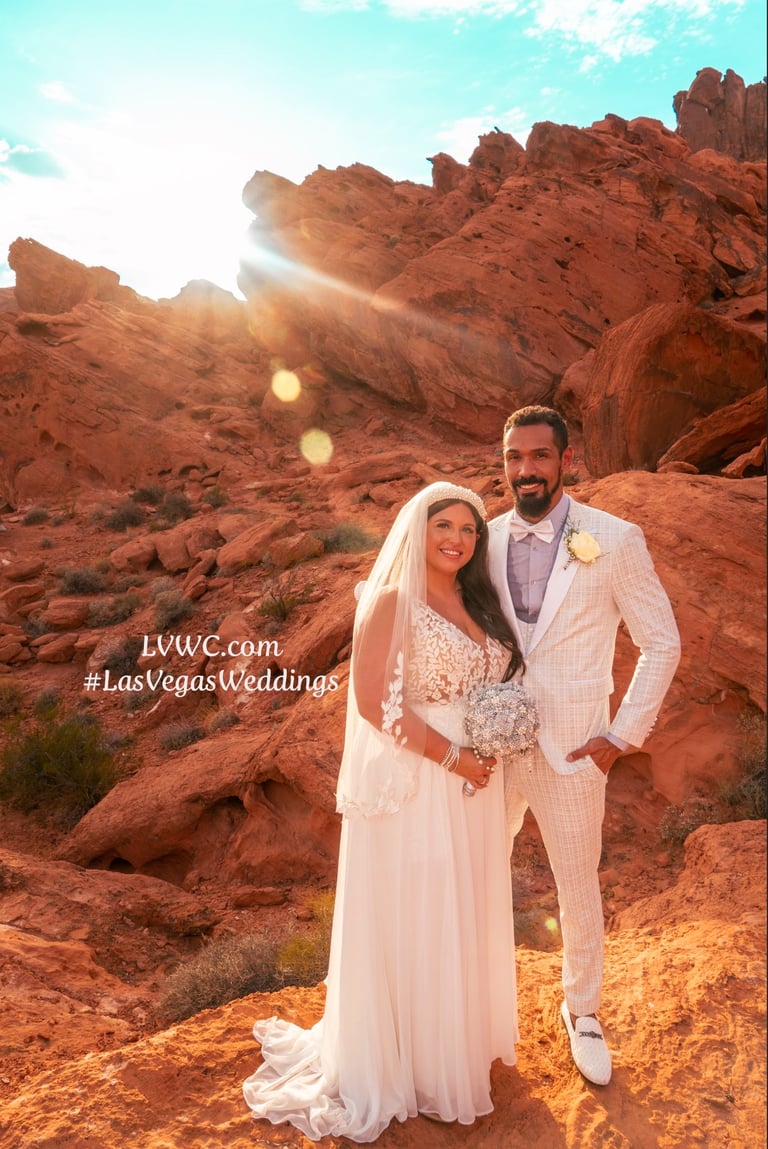 A bride and groom pose for a scenic Las Vegas desert wedding at Valley of Fire State Park.