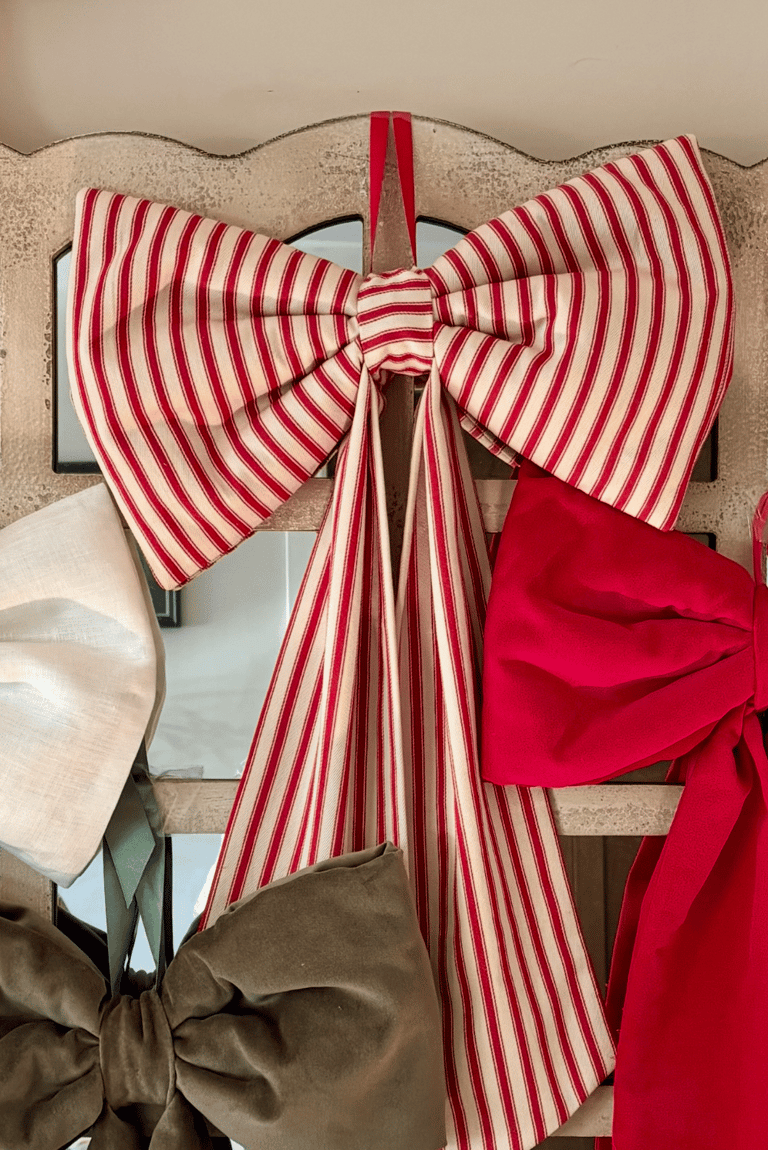 A large red stripe fabric bow 