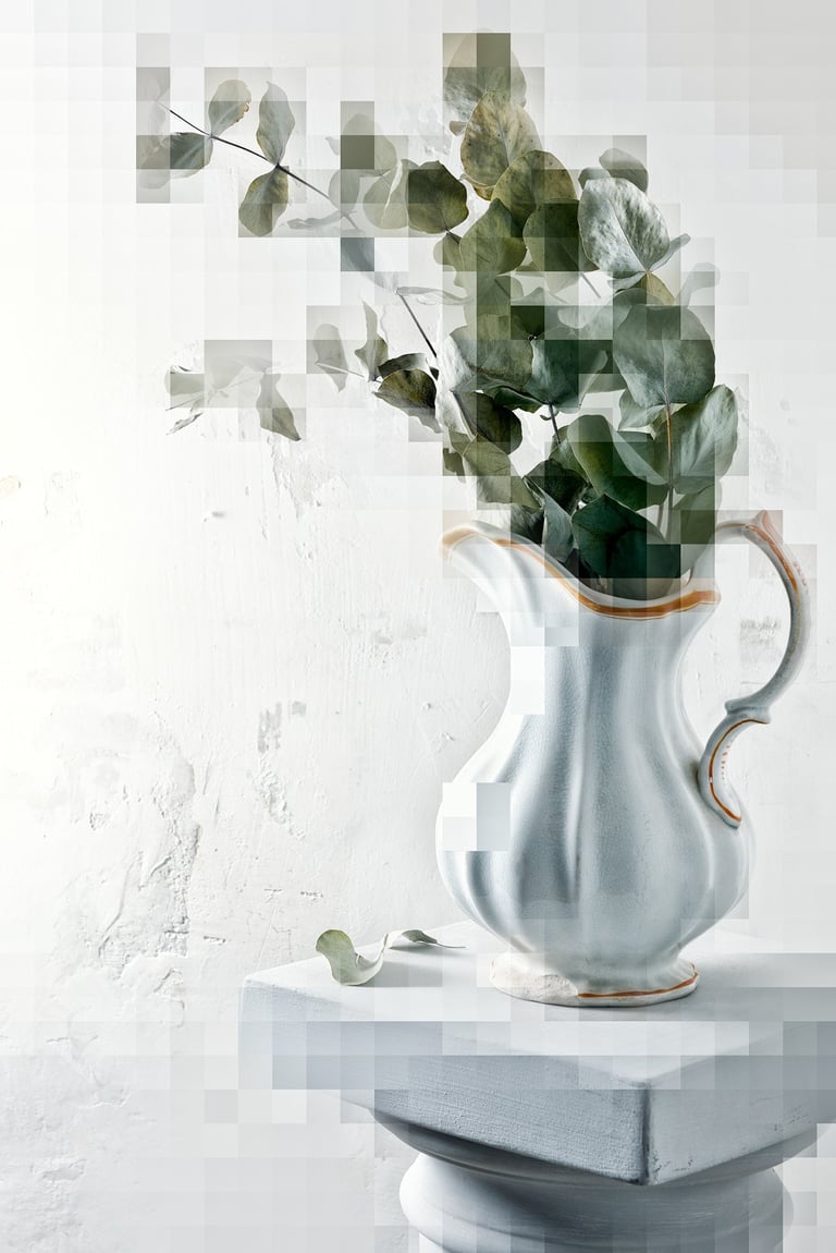 a vase with a plant in it