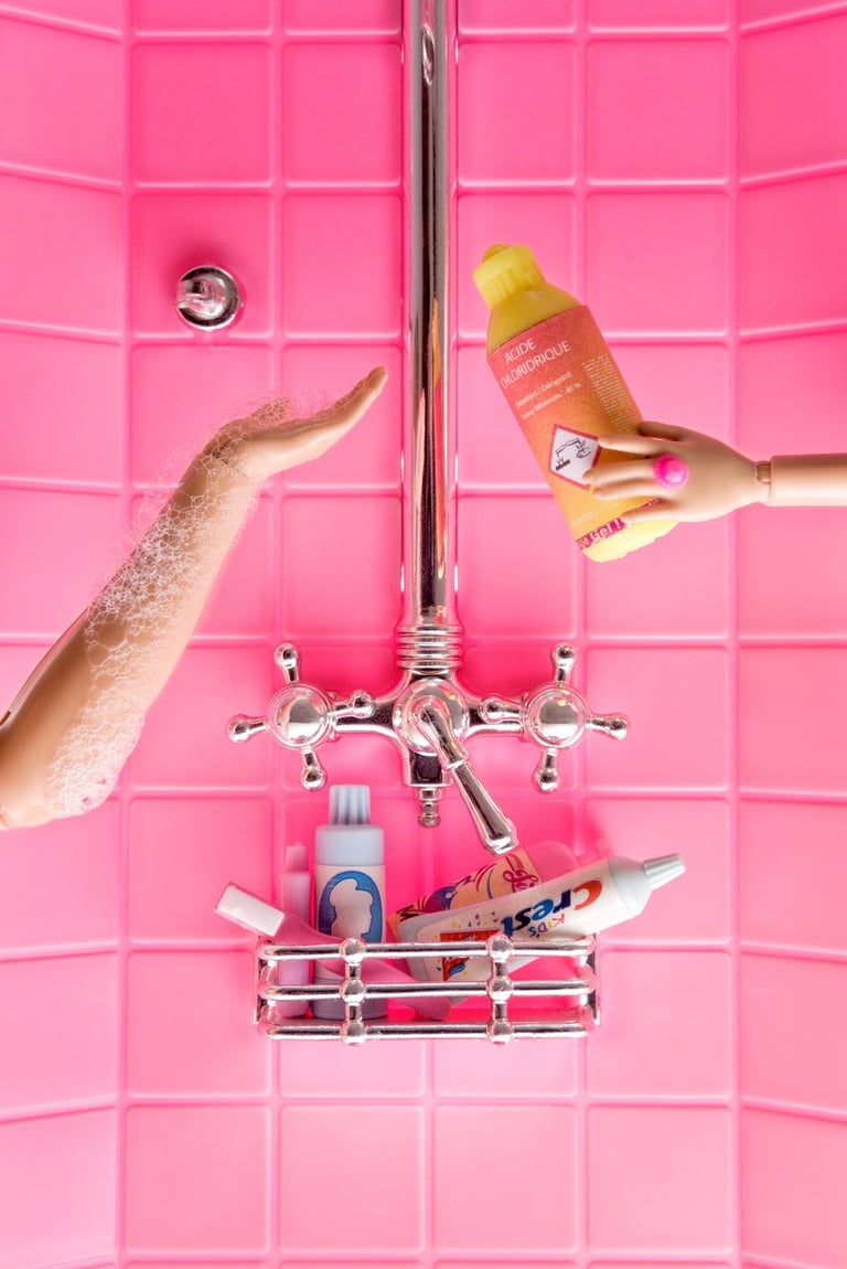 a person's hand holding a soap bar