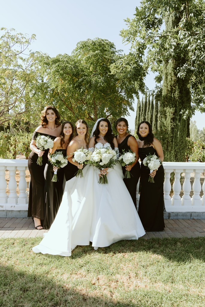 Lodi bridal party with cohesive textured hairstyles and floral hair accessories