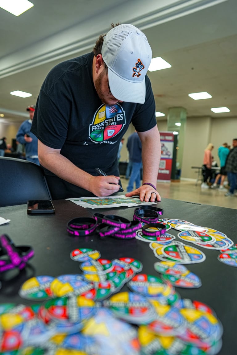 Picture of the free wrist bands and stickers given out to attendees at the Four States Card Show