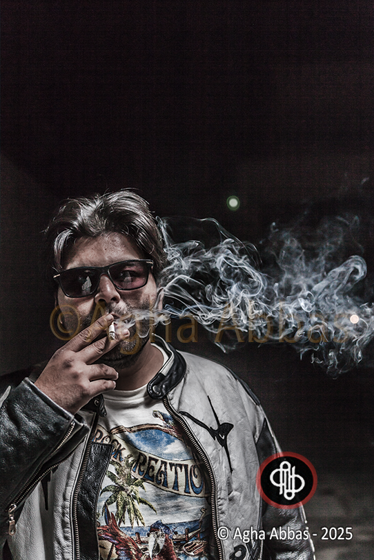 Gray-haired man in sunglasses, leather jacket, and beach t-shirt, holding cigarette with smoke, 