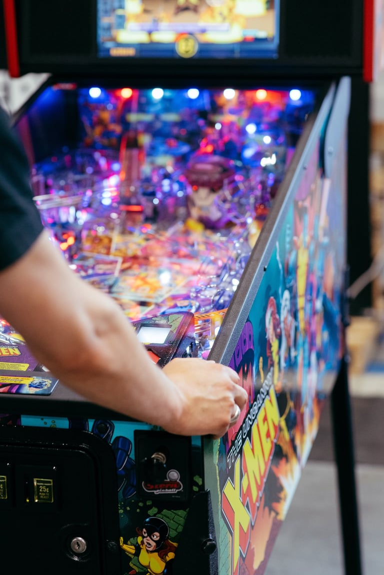 A pinball machine is being played
