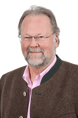 Dr. Heinik, Sportmediziner undPraxisgründer der Hausarzt-Praxis Weidenbusch in Kirchheim bei München