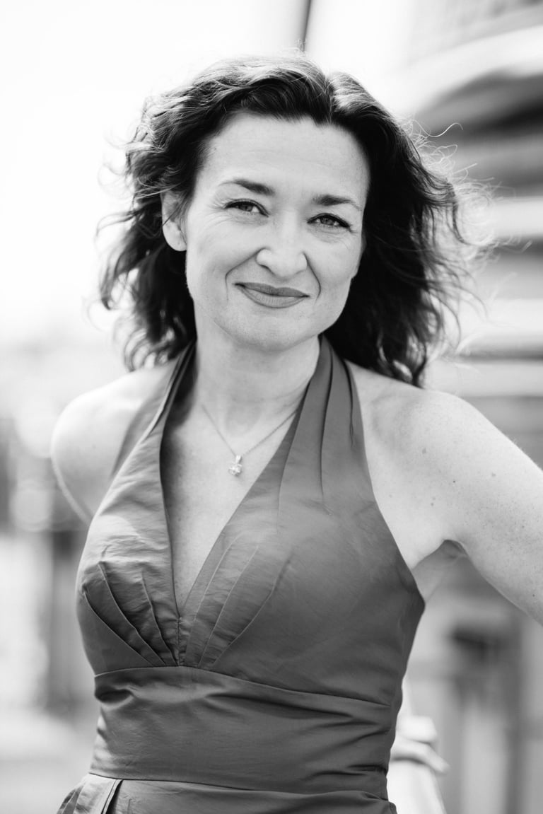 a woman in a dress with a dress on