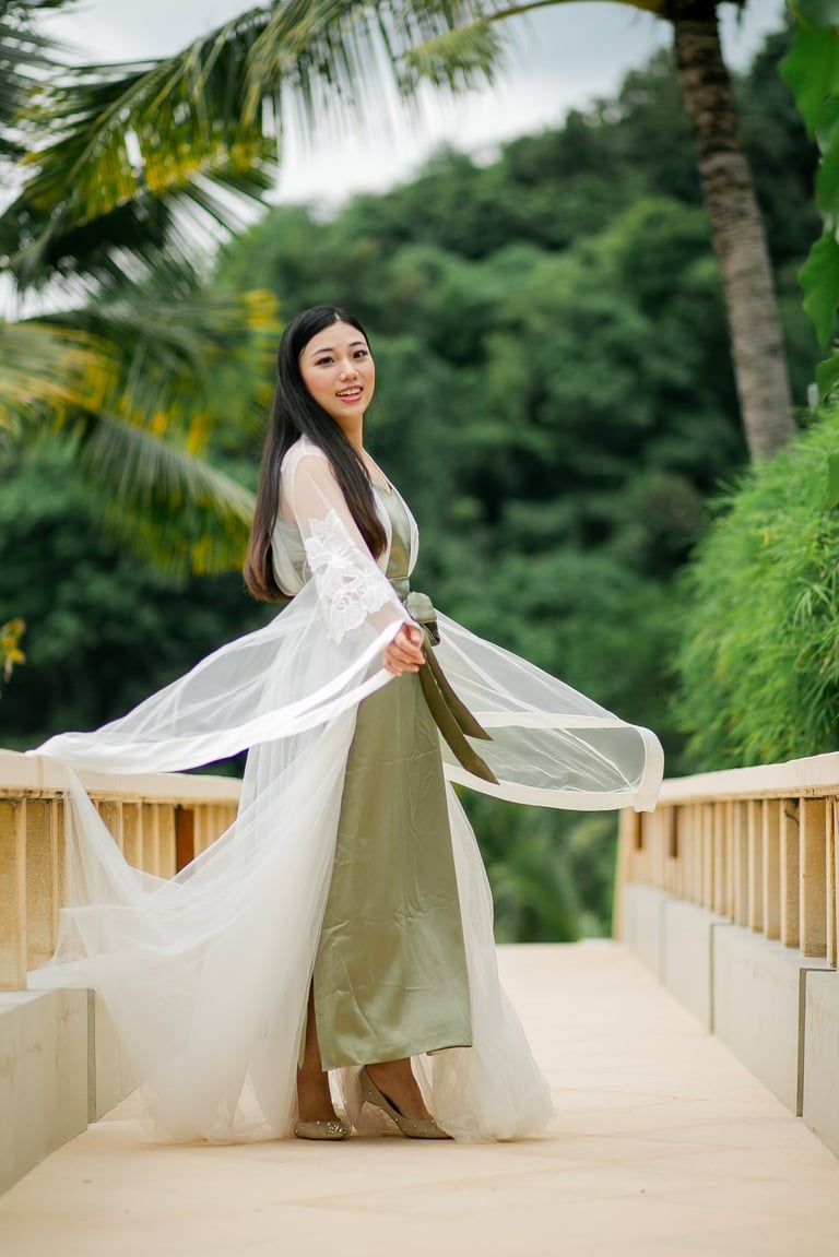 Elegant bride walking on terrace at Amankila Karangasem East Bali