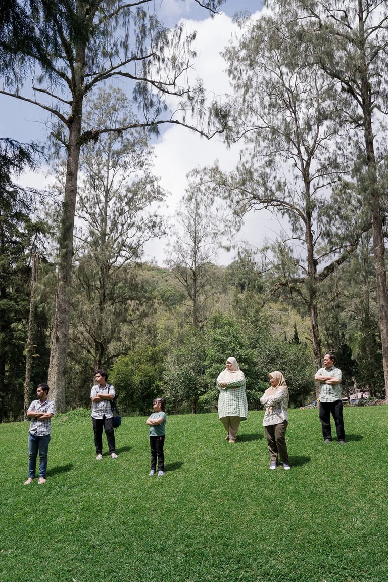 Iqbal family portrait in the open garden area of Bedugul during a family photography session.