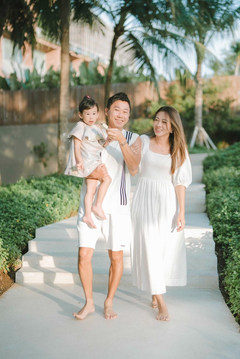 natural family portrait at W Bali Seminyak garden pathway