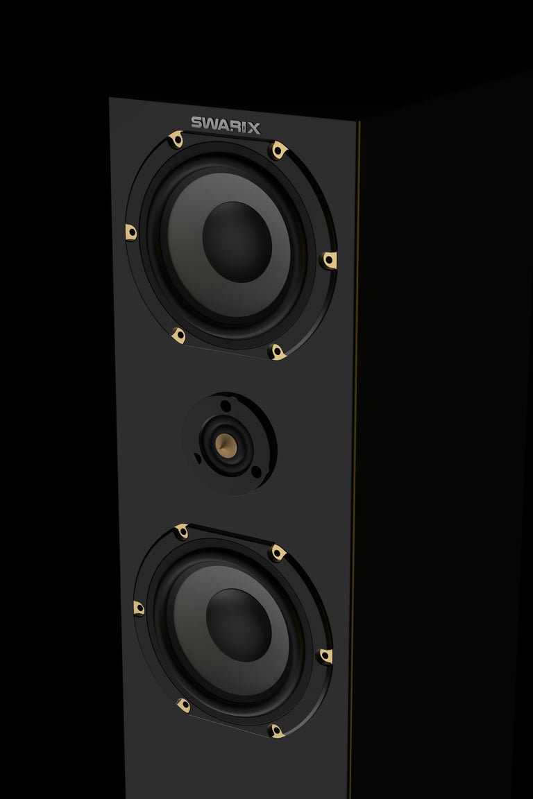 Tower speaker with gold accent driver