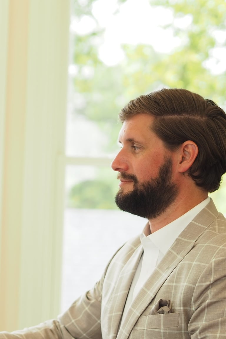 Arkansas Drug Crime Attorney Kyle Ludwig listens to a client during a free consultation. 