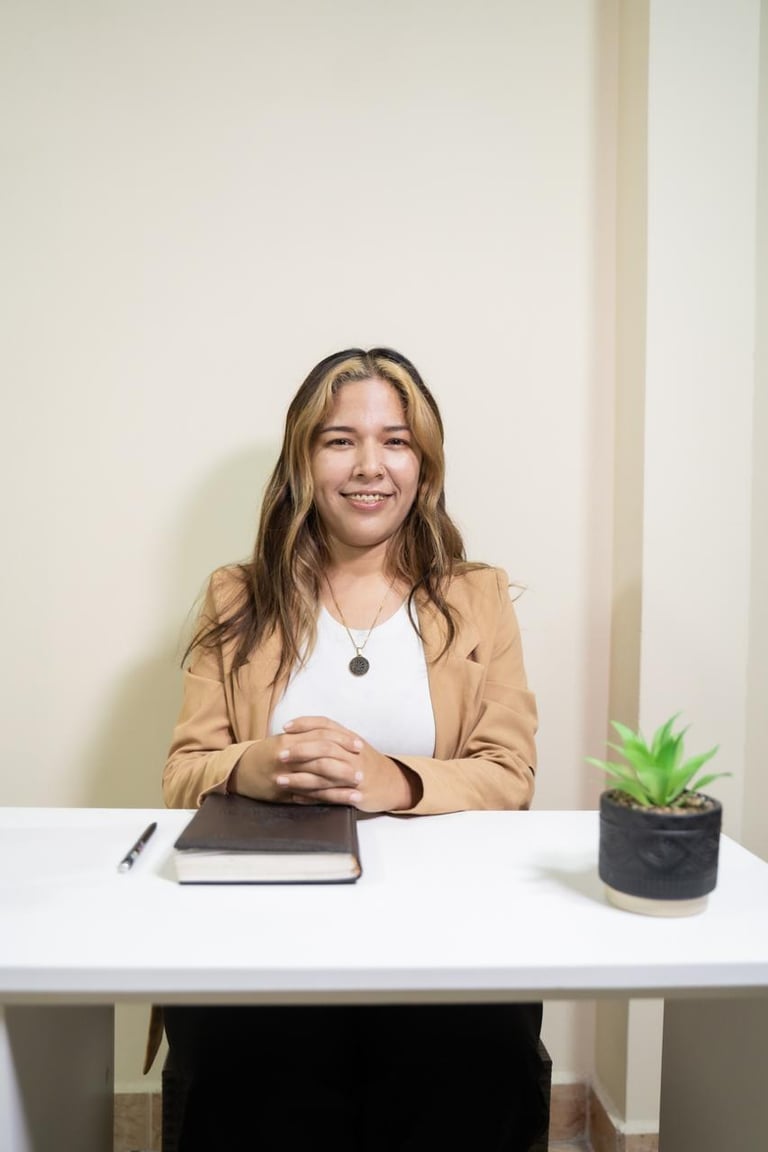 Professional psychologist smiling for a photo in formal wear