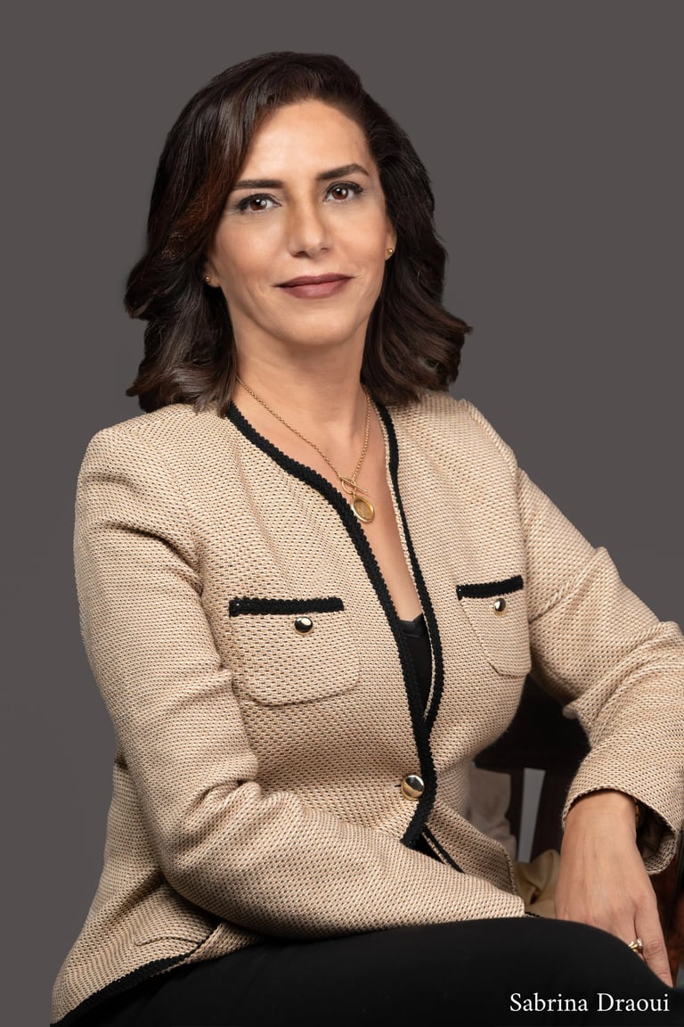 a corporate woman in a suit jacket