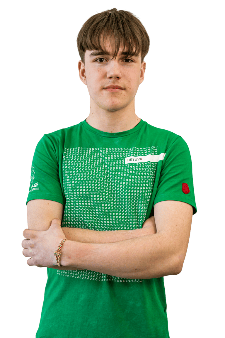 a boy in a green shirt