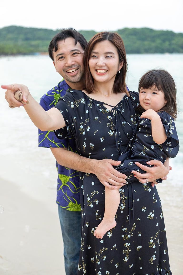 Family looking toward the sea on Khem Beach