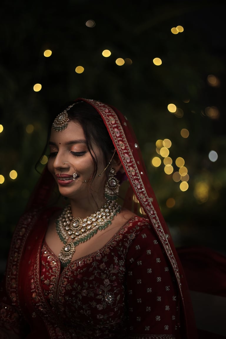 Bridal makeup Vadodara Gujarati bride in red lehenga, reception and wedding bridal portrait