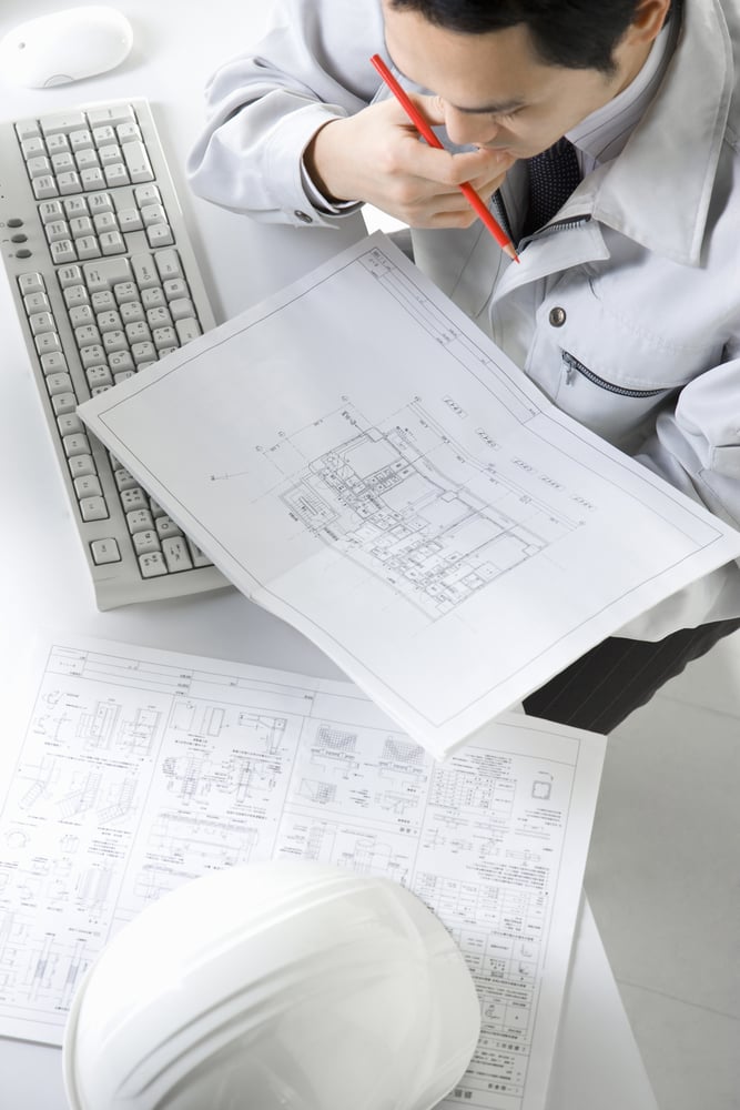 Patent examiner reviewing a patent application during the examination process